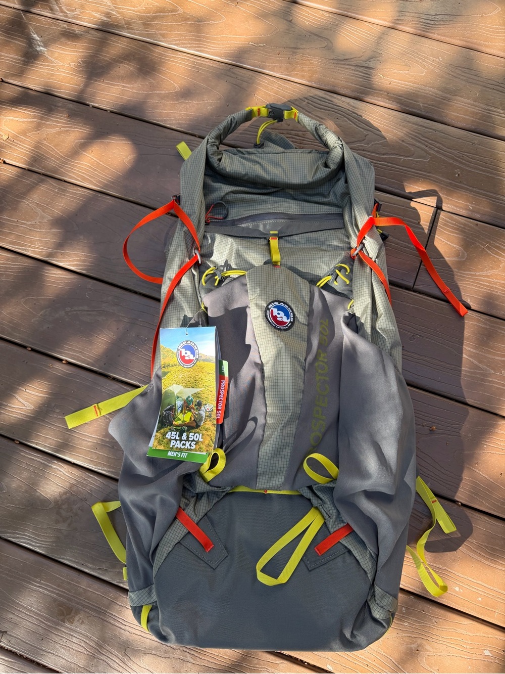 Osprey Gray Backpack with Yellow and Red Accents - Men's Hiking Pack
